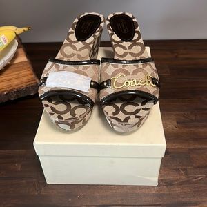 Authentic Coach Carissa wedges.